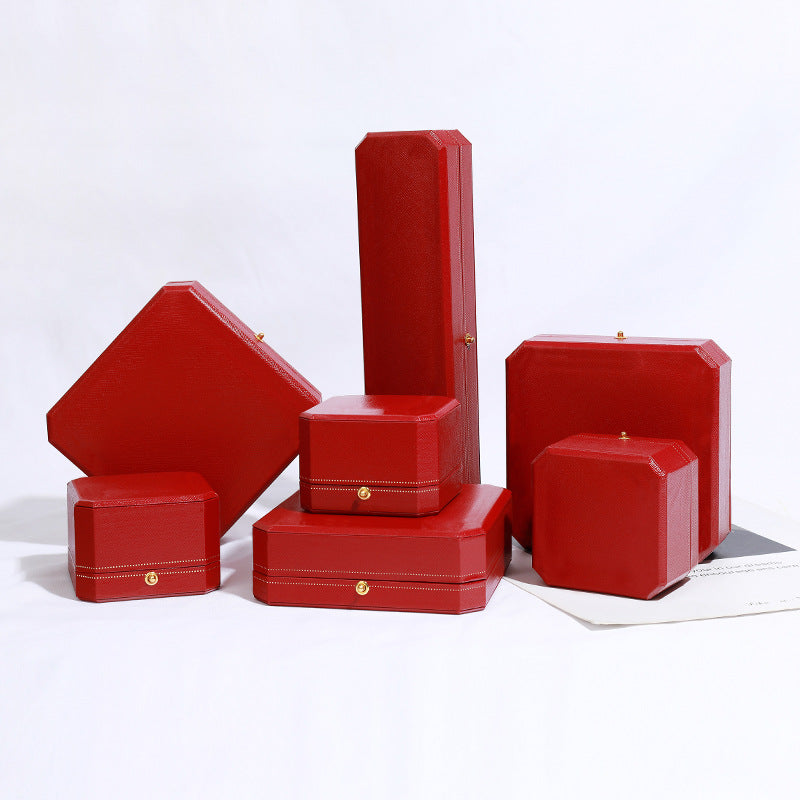Cartier-inspired red jewelry box with gold trim for rings