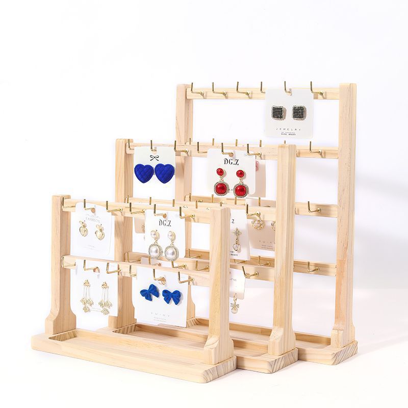 Wooden countertop display stand with hooks for retail