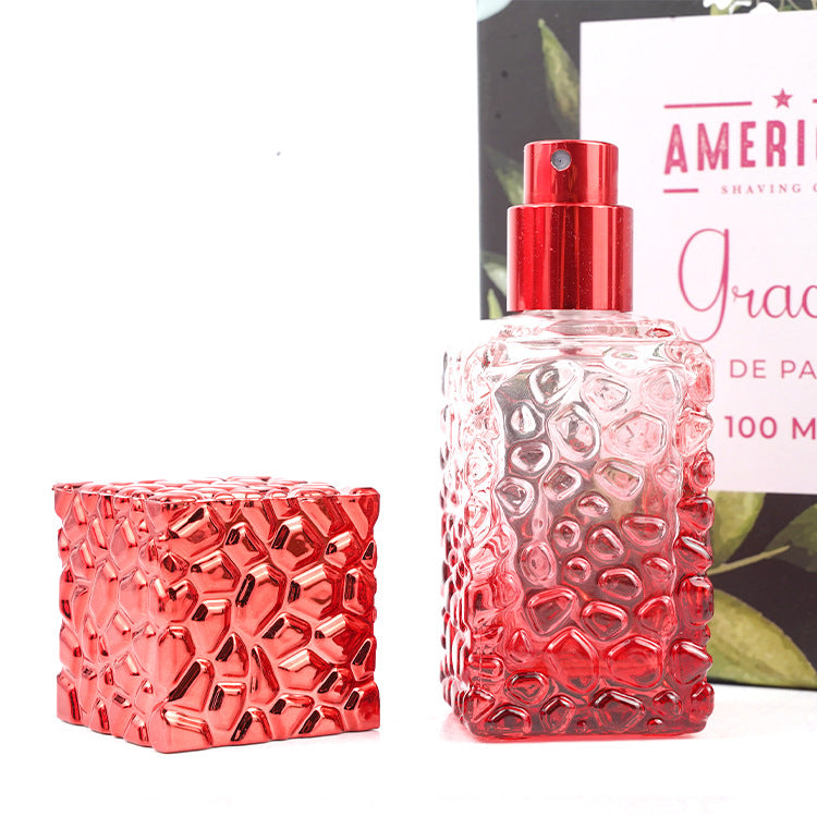 Red Square Perfume Bottle with Embossed Pattern & Pump Sprayer