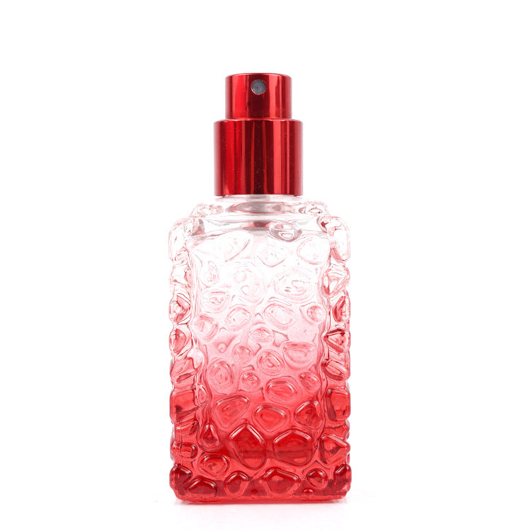 Red Square Perfume Bottle with Embossed Pattern & Pump Sprayer
