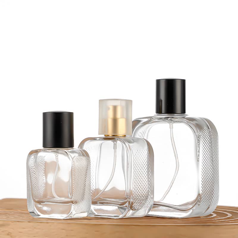 Cosource 50ml luxury glass perfume bottle set with textured design and black and gold caps