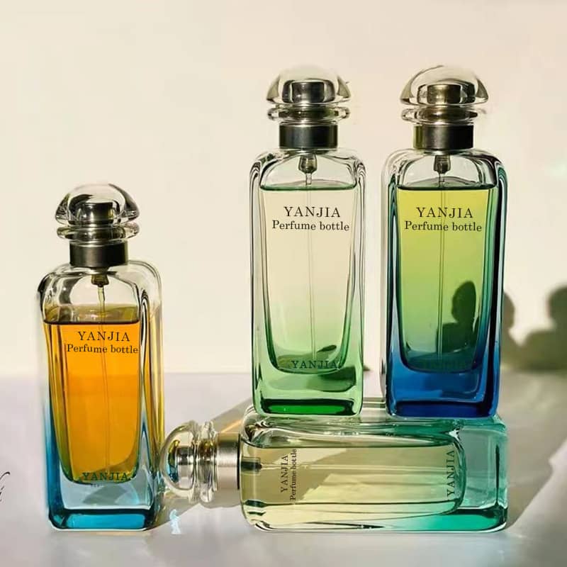 Cosource gradient glass perfume bottles with colorful ombre design and silver caps set on a white background